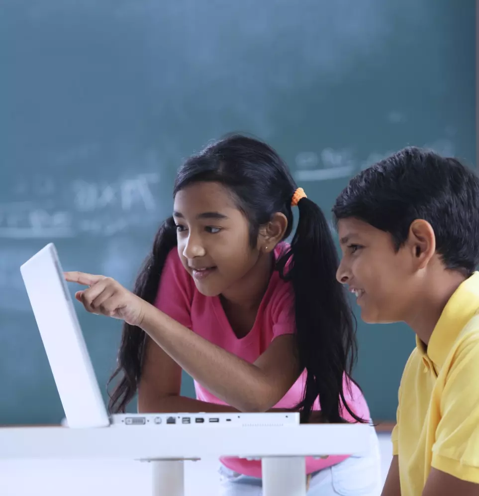 Students learning from a laptop