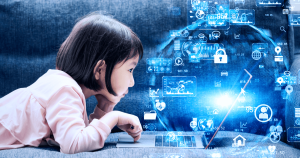 A child looking at a laptop with multiple digital app logos around her.